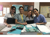 Nicole and Trina with two nurses at a hospital in Cagayan de Oro